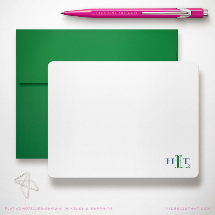 Monterey Monogram flat notecard showing small two-color monogram with a green envelope.
