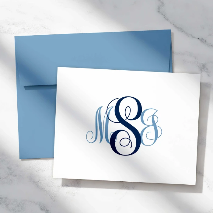 Traditional Script personalized folded notecard with a navy and light blue three-initial monogram and coordinating blue A2 envelope.