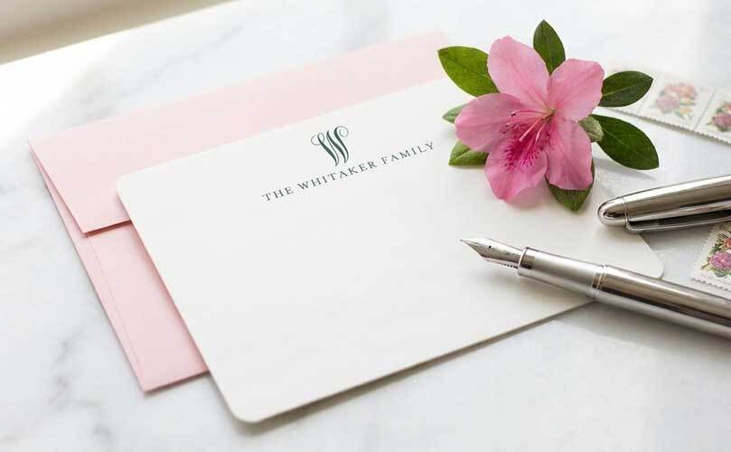 Personalized thank-you notes with envelopes on a clean marble desk for handwritten gratitude and thoughtful follow-up notes