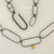 Modern Art Jewelry from Morgan Amirani | Argentium Silver Lets Connect Choker with 18 Karat Gold and Ruby accents. Modern Art Jewelry from Morgan Amirani | Argentium Silver Lets Connect Choker with 18 Karat Gold and Ruby accents.