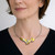 Contemporary Jewelry, Flight Necklace by Judith Neugebauer on Model | Sterling Silver and 23 Karat Gold leaf | Freshwater Pearl