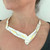 Jigsaw Necklace on model | Argentium Silver, Oxidized Silver  23 Karat Gold | Handmade Art Jewelry by Suzanne Schwartz