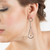 Pendulum Earrings on model, Contemporary Jewelry by Cheryl Eve Acosta Pendulum Earrings on model, Contemporary Jewelry by Cheryl Eve Acosta