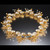 Poppy and Bud Garland Necklace from Carol Salisbury | Argentium Silver and 24 Karat Gold Vermeil with 2 mm Blue Topaz and Amethyst | White Freshwater Cultured Pearls Poppy and Bud Garland Necklace from Carol Salisbury | Argentium Silver and 24 Karat Gold Vermeil with 2 mm Blue Topaz and Amethyst | White Freshwater Cultured Pearls