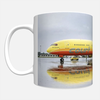 Front view of fictional yellow Court Line Boeing 787 Dreamliner ceramic mug