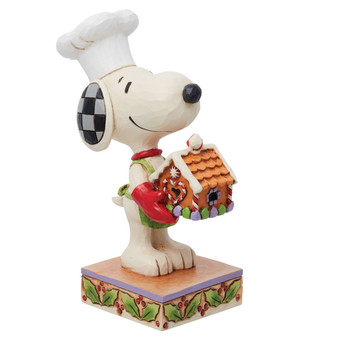 Snoopy Holding Gingerbread House