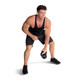 Model doing single arm kettlebell snatch with CAP Hammertone Cast Iron Kettlebell