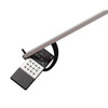 Close-up of the RTL5020 reacher jaw gripping a television remote control