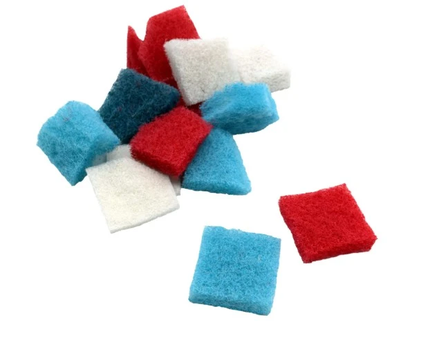 Assorted filter media pads in red, blue, and white colors for pond filtration and debris removal.