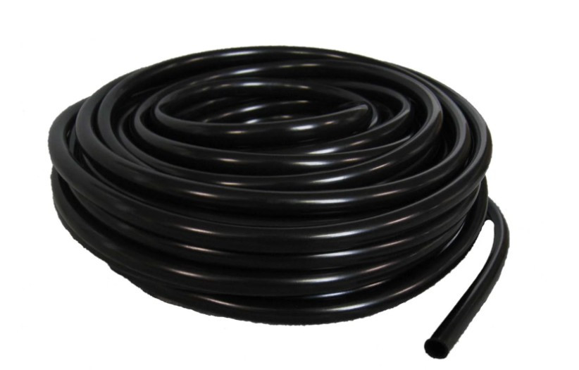 Coiled black flexible pond tubing for water flow and filtration system connections.