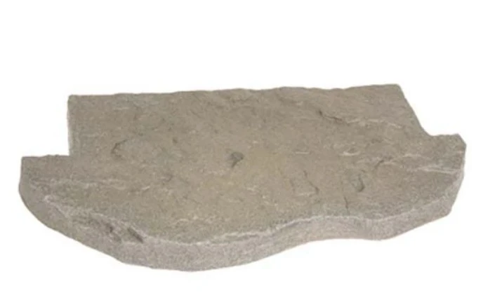 Faux rock skimmer lid cover designed to conceal pond skimmer and blend into landscape.