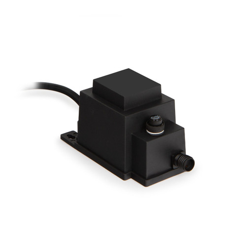 Black low-voltage transformer with attached power cord and fuse button. Black low-voltage transformer with attached power cord and fuse button.