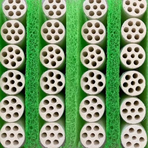 7-hole bacteria house cassette pieces set in between Green porous filter mat cassette pieces 7-hole bacteria house cassette pieces set in between Green porous filter mat cassette pieces