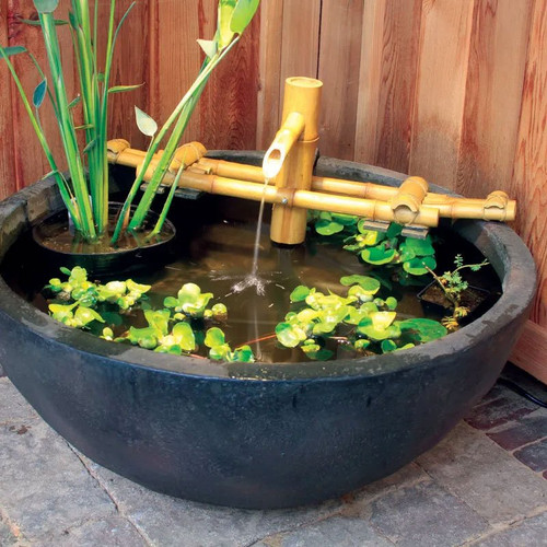 Front view of the Adjustable Pouring Bamboo Fountain, showcasing the bamboo spouts arranged vertically with adjustable water flow, creating a peaceful and natural water feature for gardens or patios. Front view of the Adjustable Pouring Bamboo Fountain, showcasing the bamboo spouts arranged vertically with adjustable water flow, creating a peaceful and natural water feature for gardens or patios.