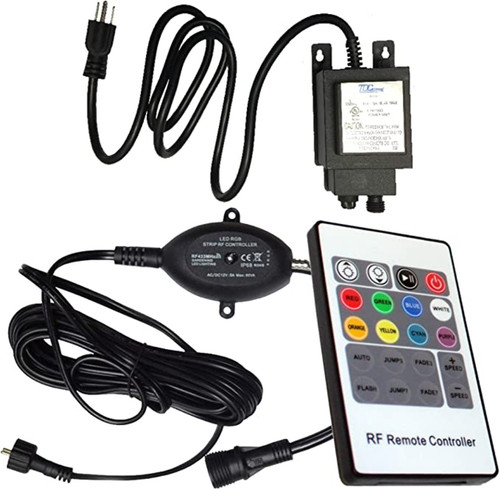 Front view of the 12-Watt transformer and inline remote controller showing the rectangular metal housing with wattage and model label on the face. Front view of the 12-Watt transformer and inline remote controller showing the rectangular metal housing with wattage and model label on the face.