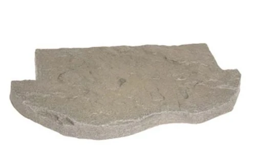Faux rock skimmer lid cover designed to conceal pond skimmer and blend into landscape.