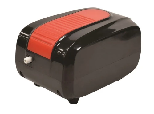 Pond air pump with compact housing and air outlet for aeration system use.