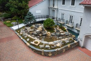 Project Spotlight : "The Blend": A Fishless Pond and Retaining Wall-image-2