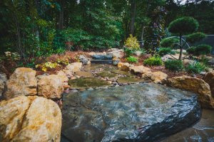 Bringing Nature and Functionality Together with a Custom Pergola and Stonework