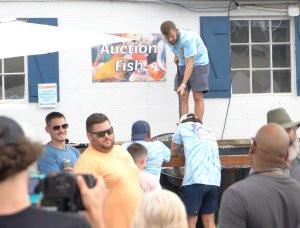 Fitz catching fish for the Auction during Koi Fest in Milford, NJ