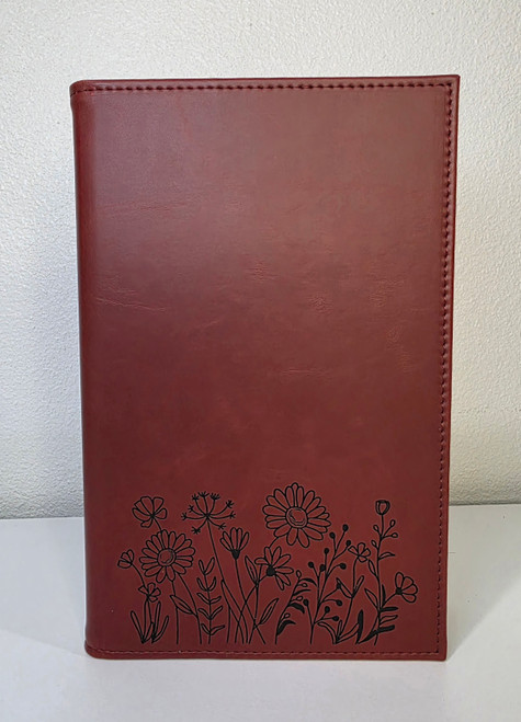 wildflowers engraving on red notebook journal