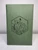 floral design engraving in middle on sage notebook journal