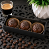 Three handcrafted Espresso Coffee Bombs arranged in a gift box with espresso-inspired styling by Bomb Confections.