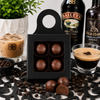 Four Baileys and espresso bonbons in a black bottle hanger gift box with coffee and espresso cocktail accents