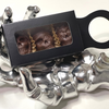 The Small Bottle Hanger Gift Box contains 3 Bourbon Chocolate Skulls with Pecans