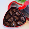 bourbon chocolate skulls in red heart tin