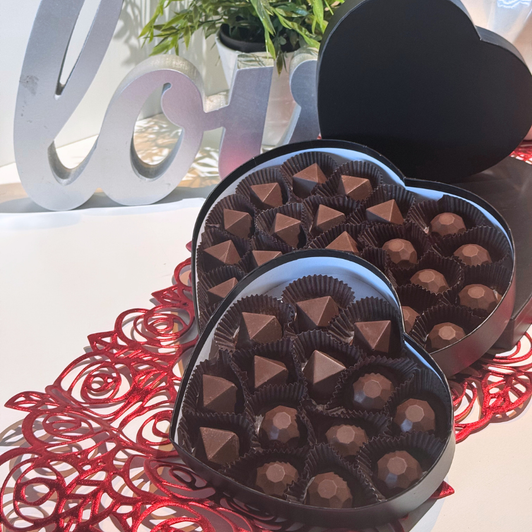 Black heart box filled with bourbon bonbons
