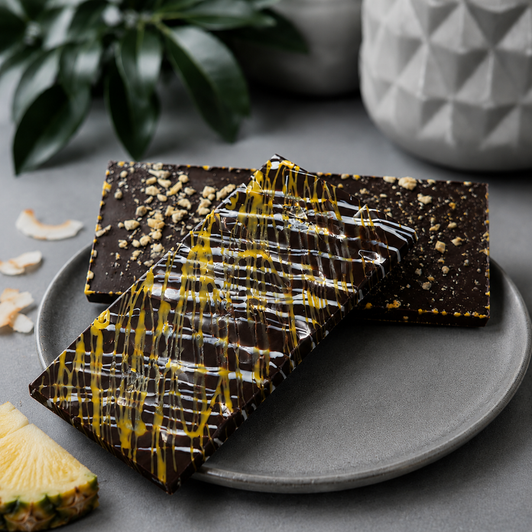 rum chocolate bar with toasted coconut and freeze dried pineapple bits