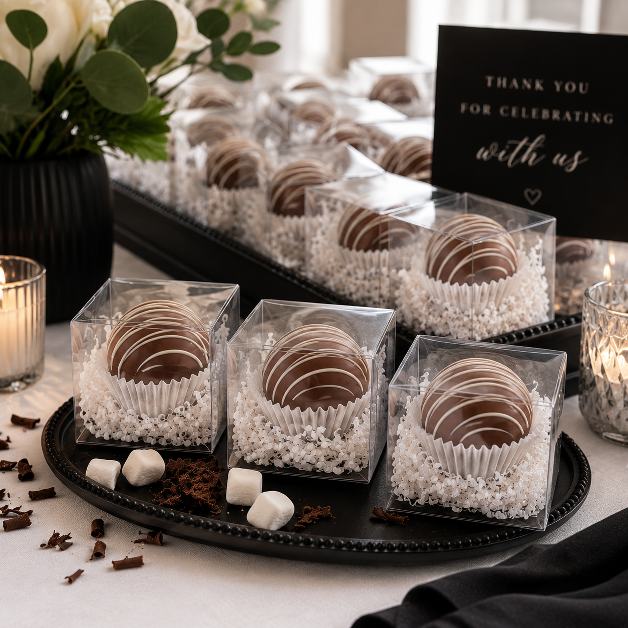 Bomb Confections hot cocoa bomb favors displayed for a wedding or special event