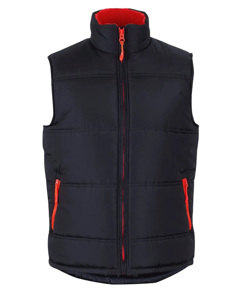 A black puffer vest with a red interior and zippers, featuring a high collar and side pockets.
