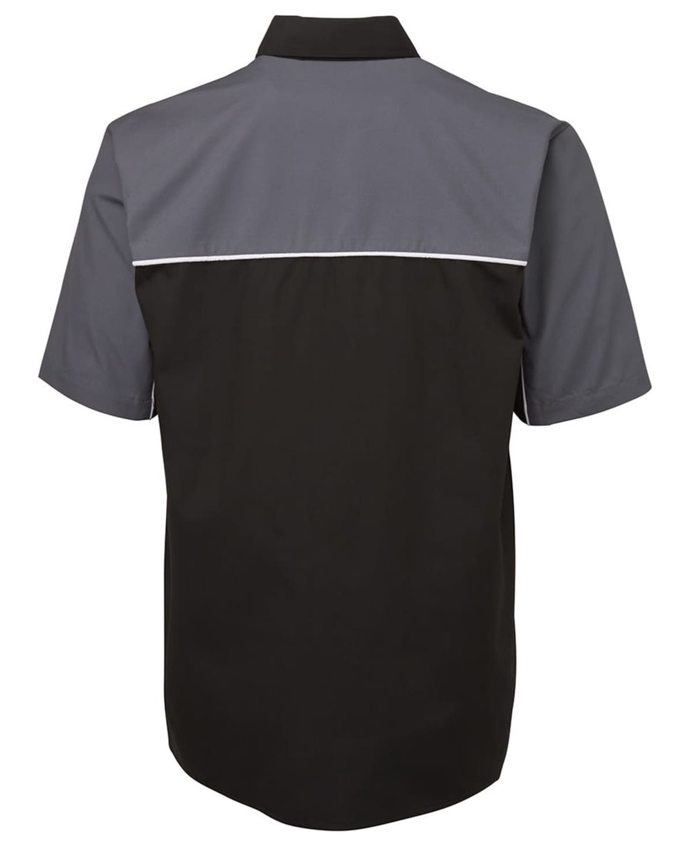 A black and grey button-up shirt with short sleeves and a contrasting yoke design, featuring a logo.