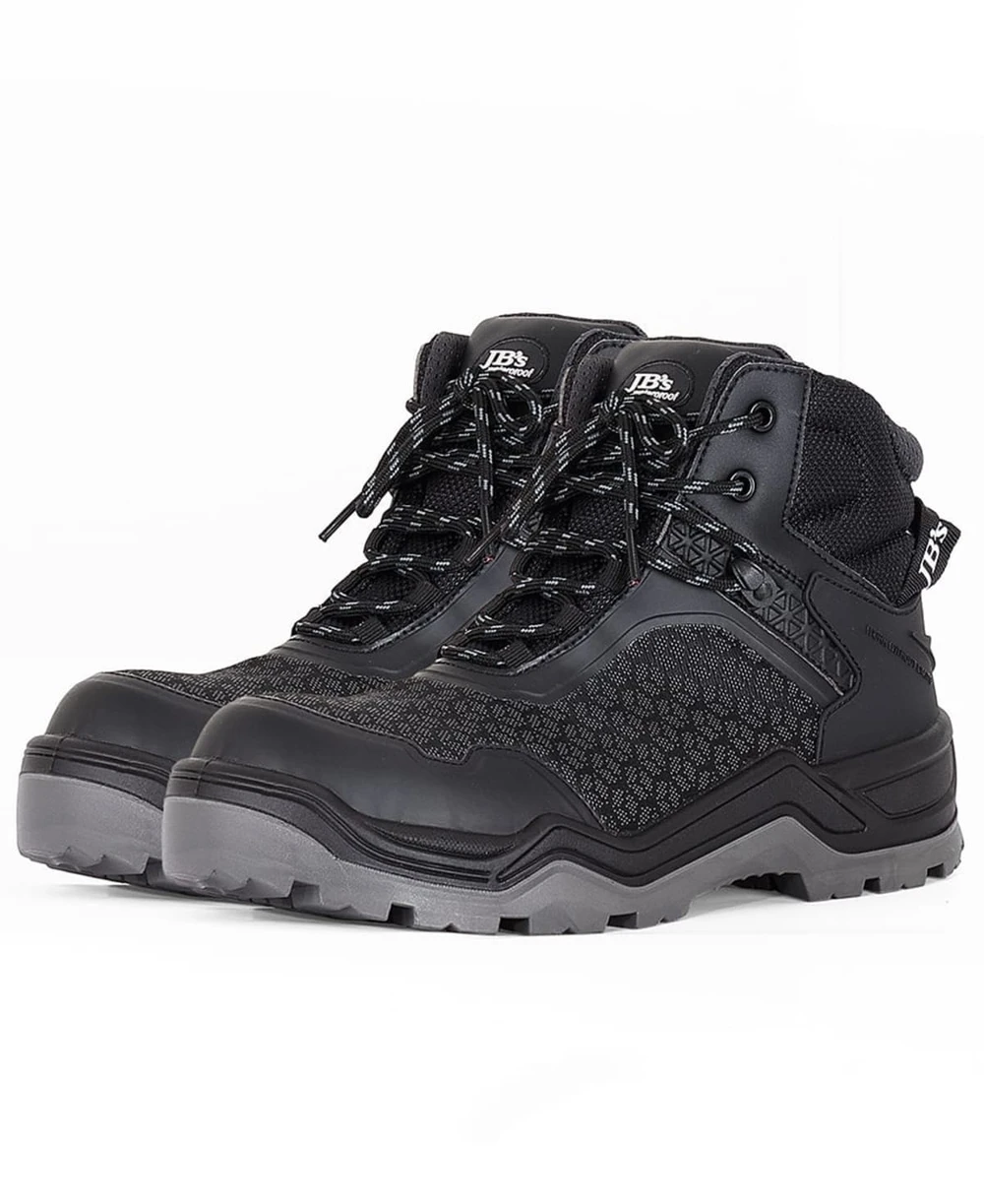 A pair of black cyclonic waterproof boots with textured detailing and a logo on the side.