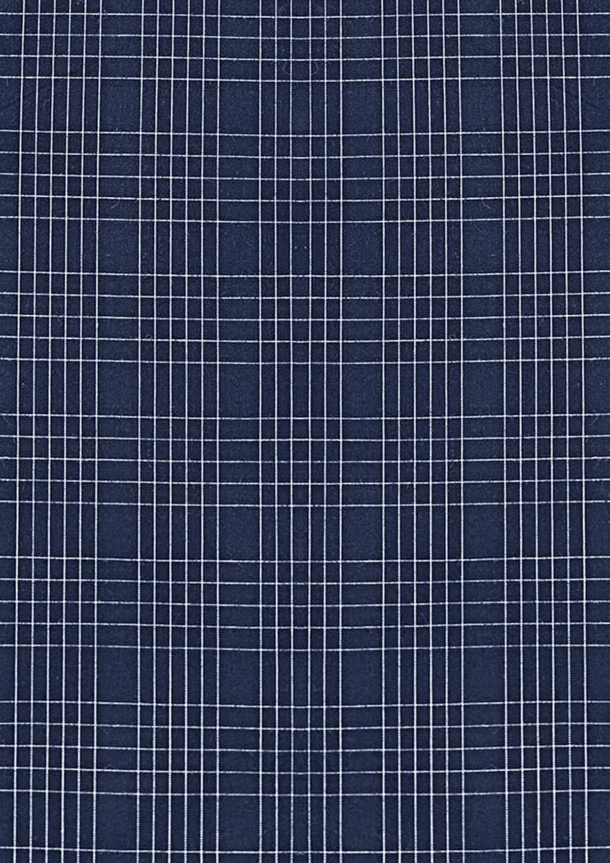 A patterned fabric featuring dark navy and white checked designs, suitable for a button-up shirt.