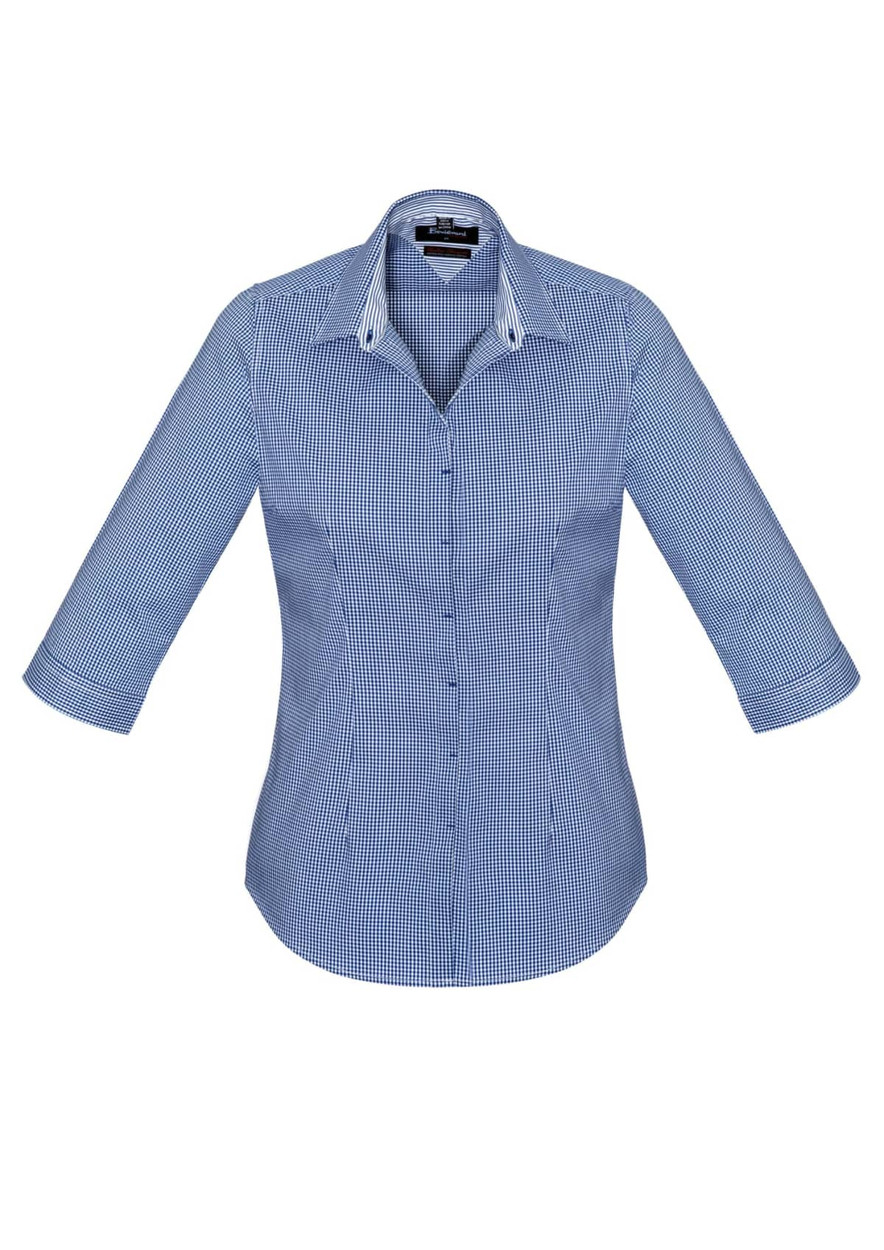 A women's 3/4 sleeve button-up shirt in a blue checkered pattern, featuring a collar and a logo.