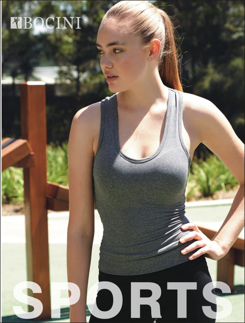 A grey singlet with a fitted design and bra insert, featuring a logo, displayed outdoors.