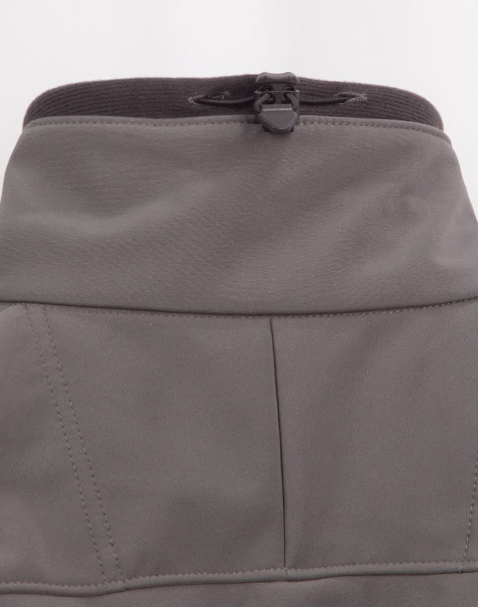 A grey softshell jacket featuring a zip at the collar and a black trim, with a logo on the back.