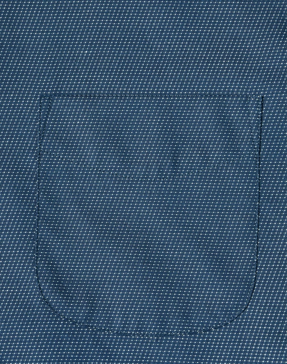 A close-up of a blue men's button-up shirt featuring a pin dot pattern and a pocket.