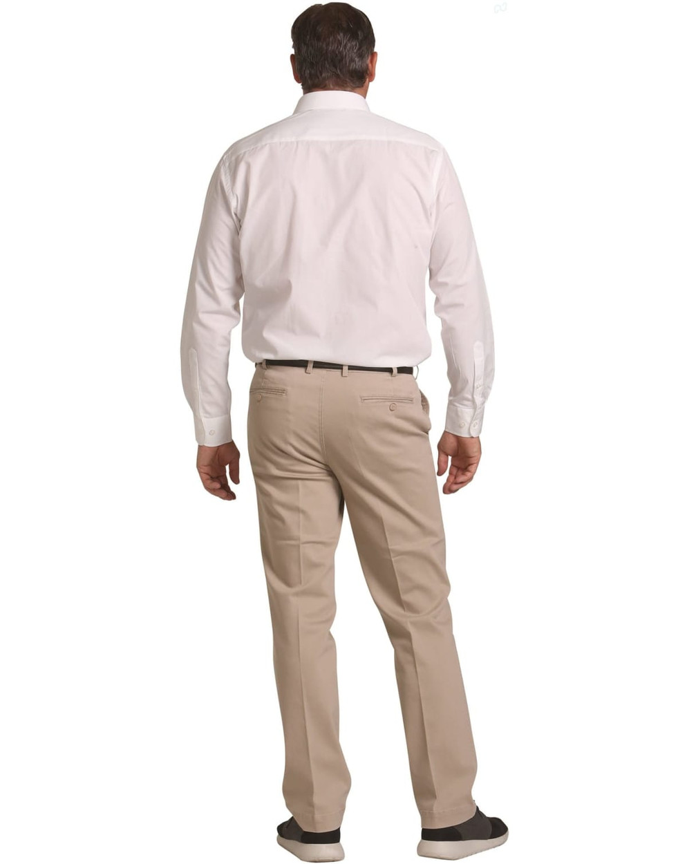 Men's chino pants in beige, viewed from the back, paired with a white button-up shirt. Features branding on the pants.