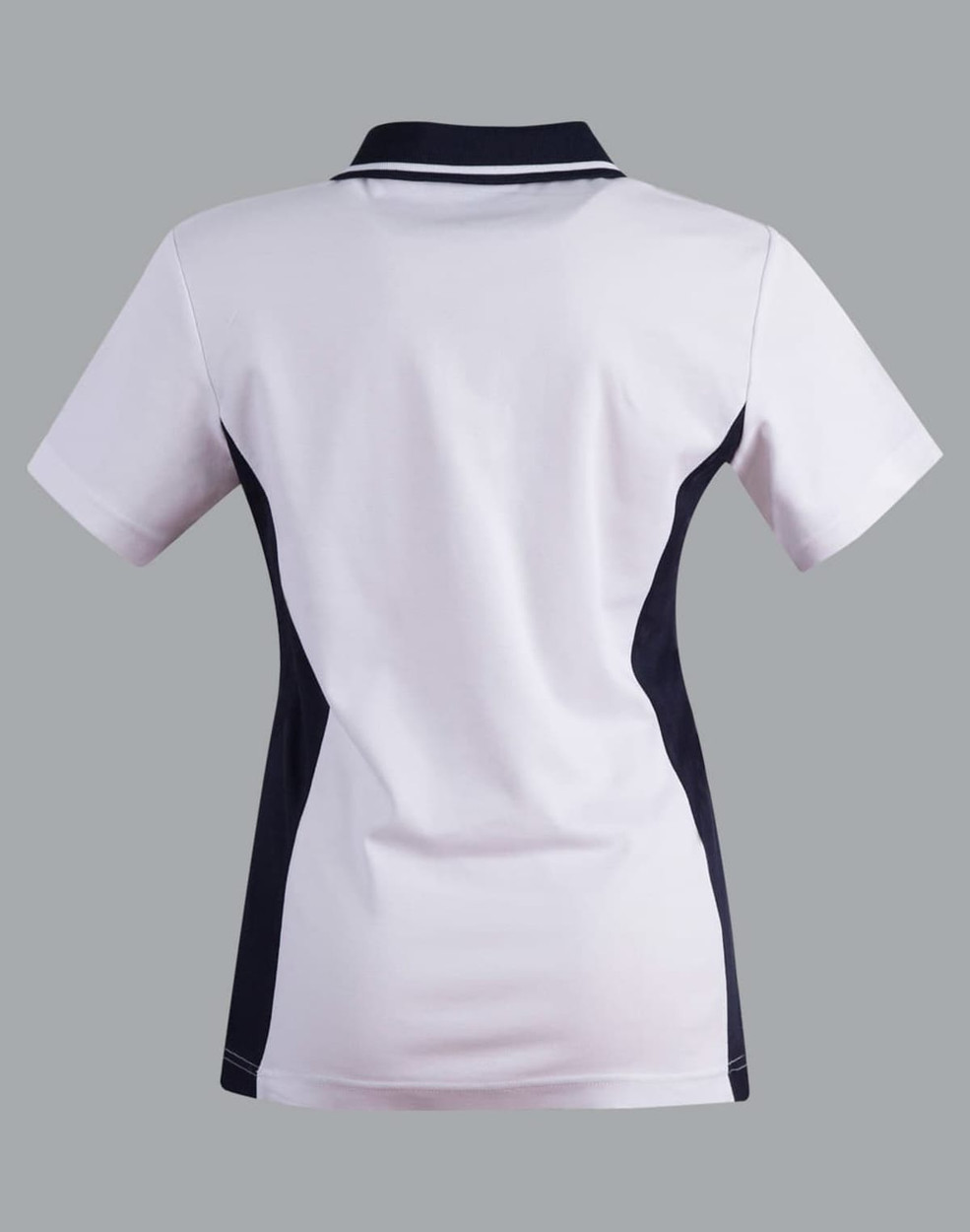 A ladies' polo shirt in white with navy contrast accents, featuring a collar and short sleeves. It has a logo detail.