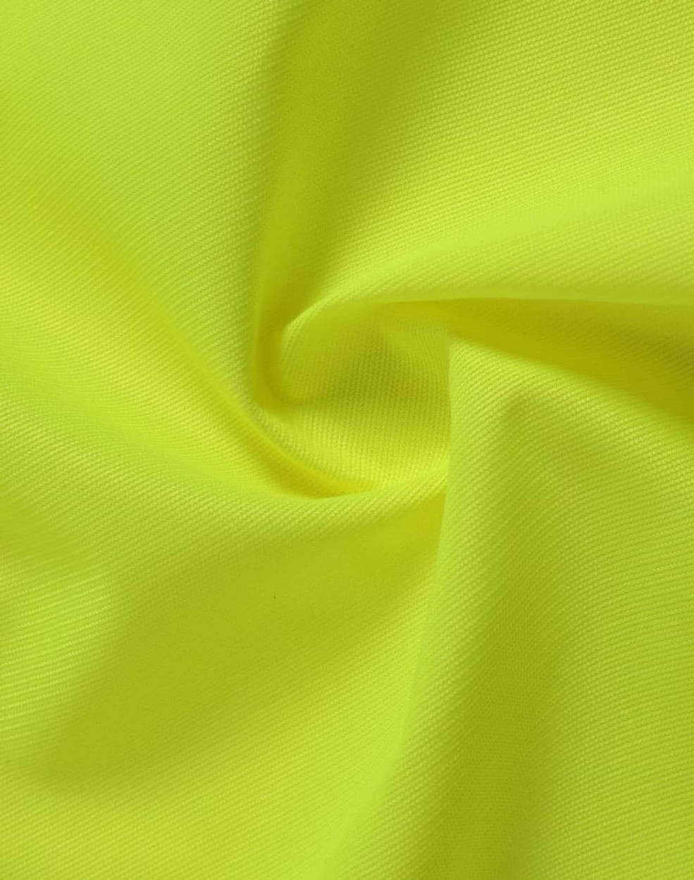 A close-up of bright yellow fabric, showcasing a textured, high-visibility material ideal for safety wear.