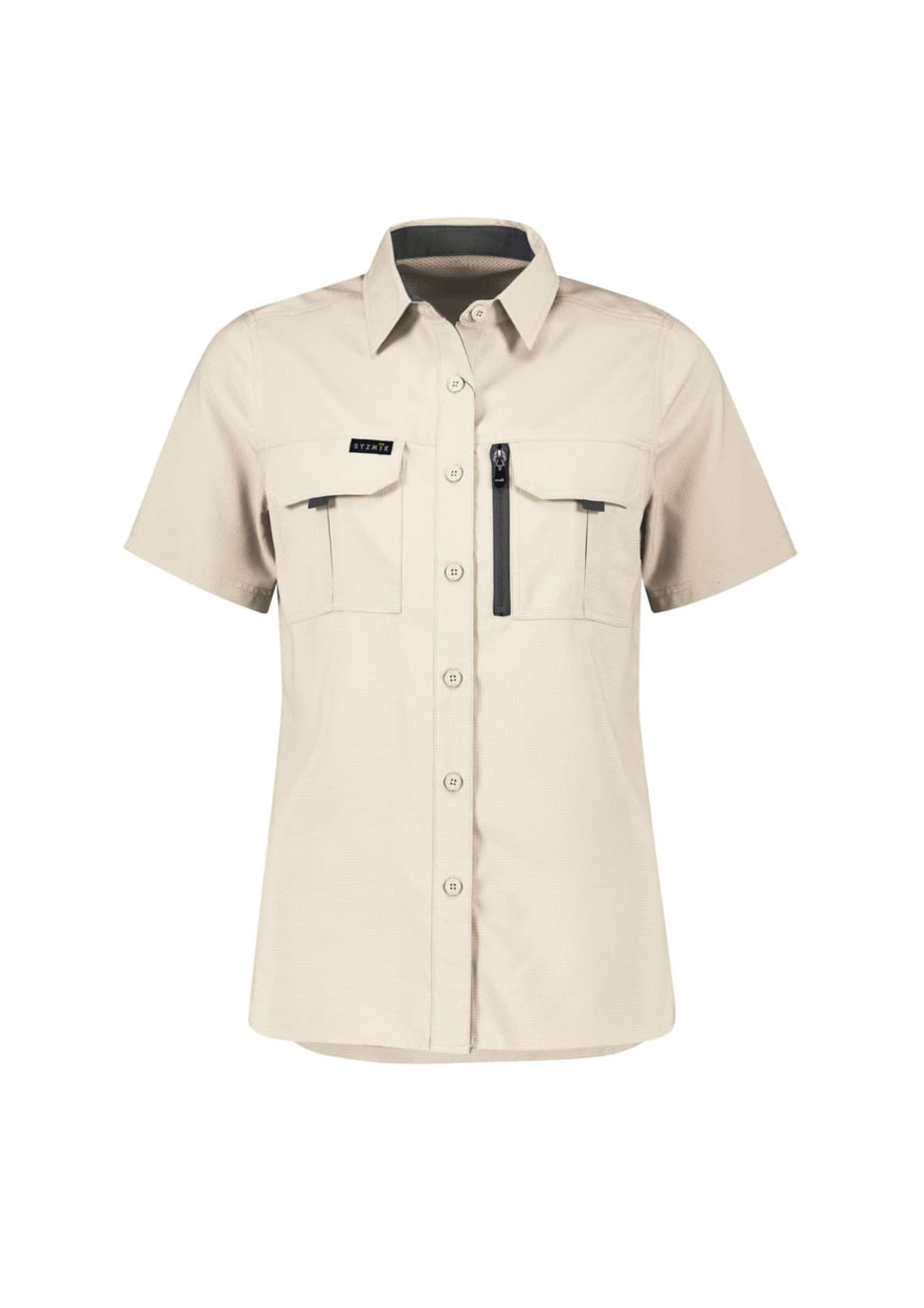 A short sleeve women's outdoor shirt in light beige, featuring two front pockets and a zip pocket, with a logo.
