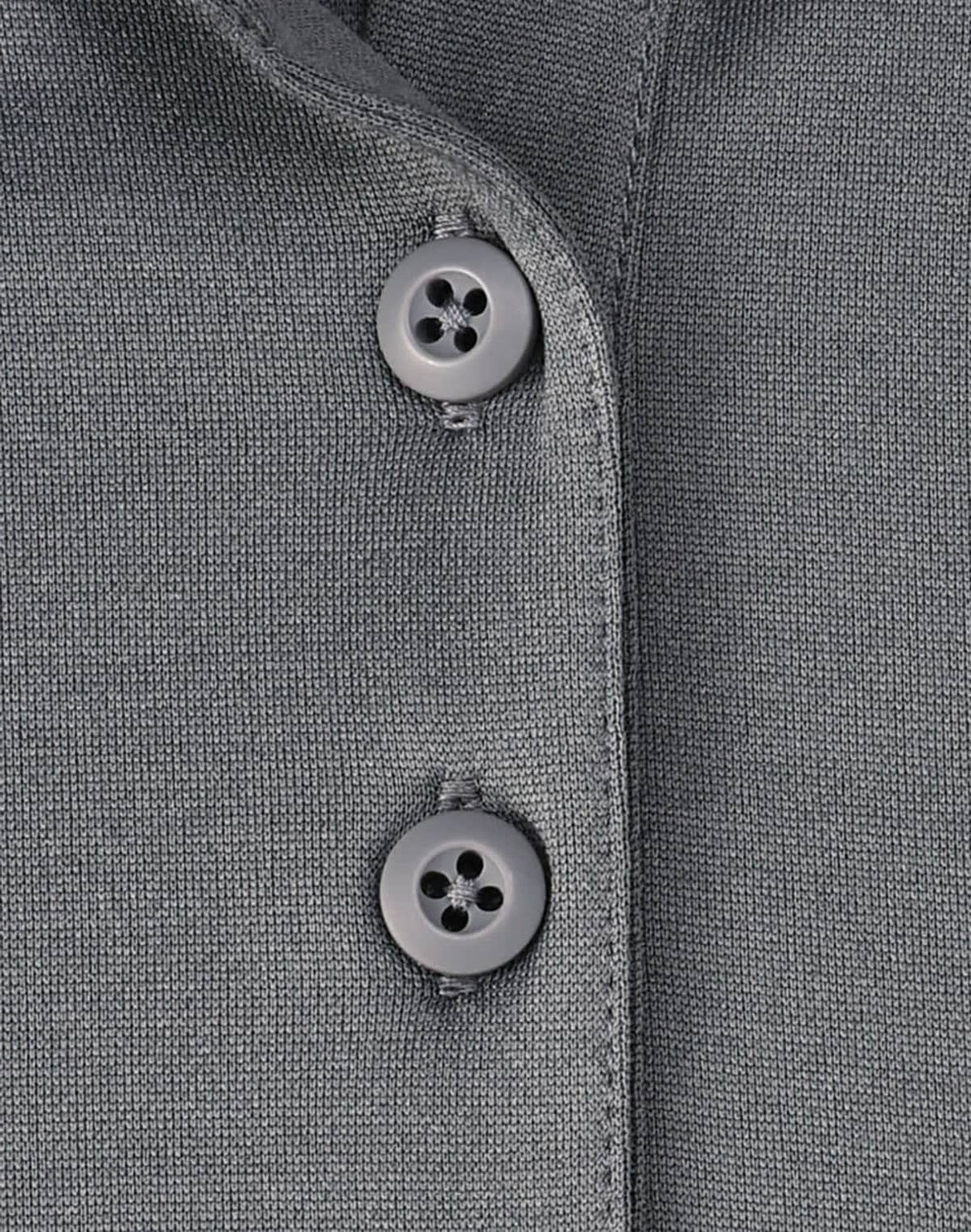 A grey polo shirt featuring two grey buttons on the collar, made from sustainable poly/cotton fabric.