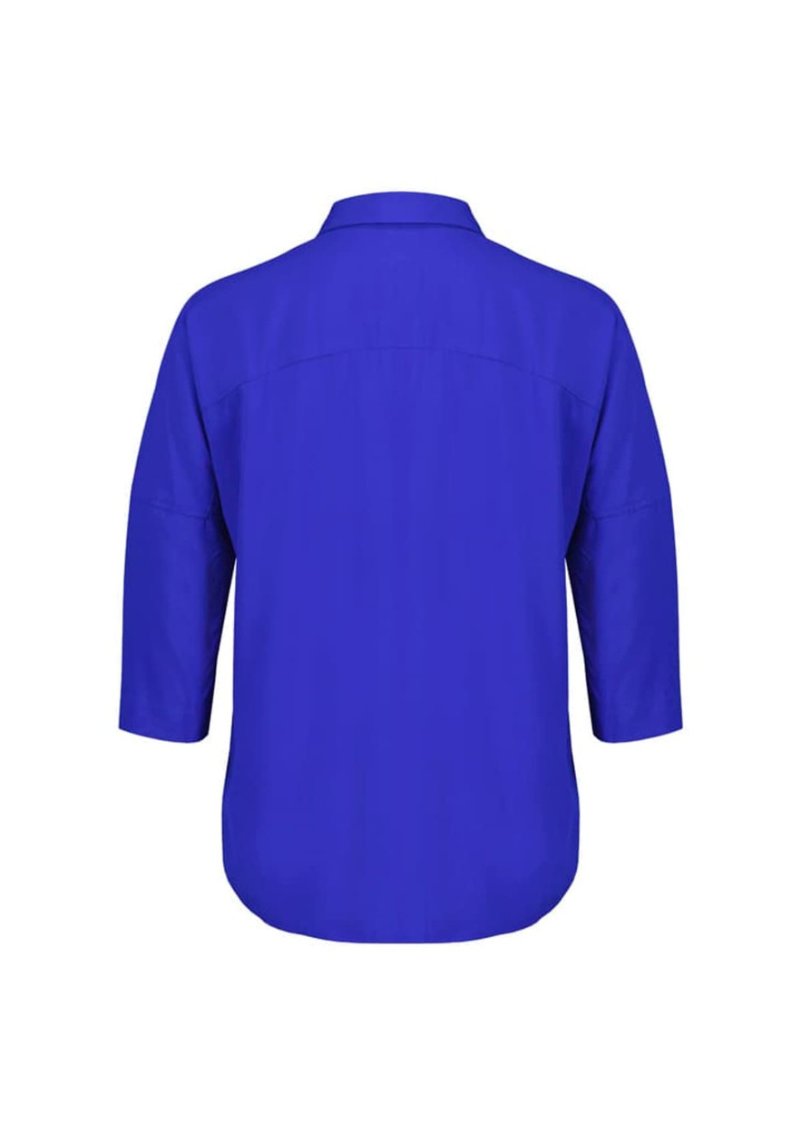 A blue women's blouse with 3/4 sleeves, featuring a collared neckline and a relaxed fit. It has a branding logo.