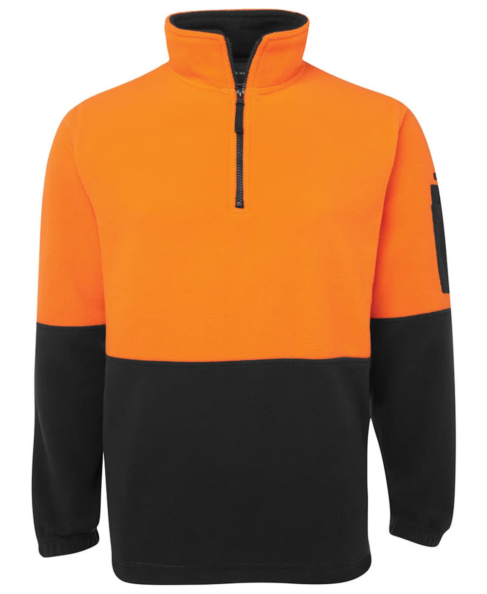 An orange and black polar fleece with a half-zip collar, featuring a side pocket and a logo.
