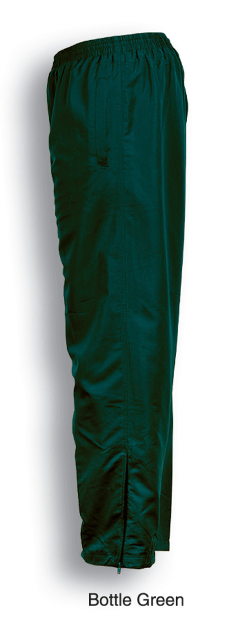 Bottle green track pants with elastic waistband and zippered cuffs, featuring a logo. Suitable for kids' casual wear.