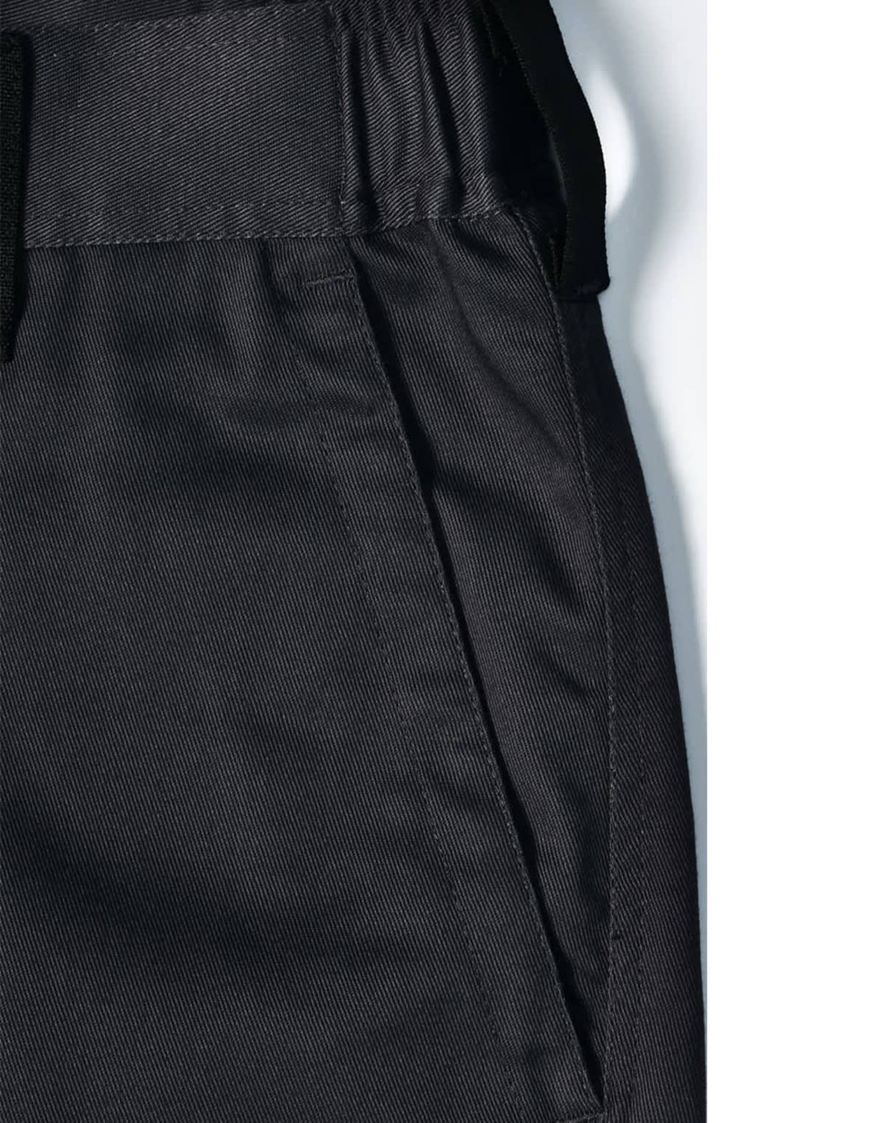 Unisex black utility stretch cargo work pants featuring an elastic waistband and side pockets. Includes branding.